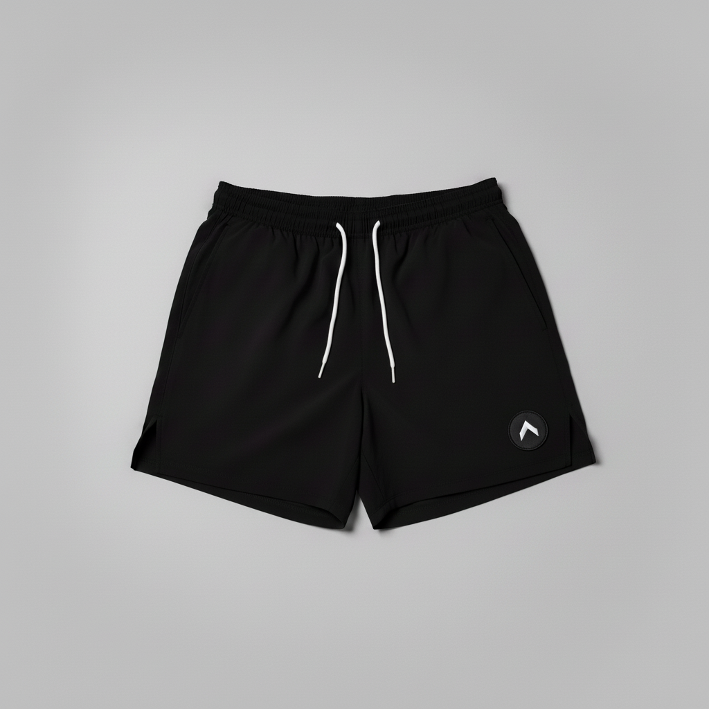 Black 7" swim trunks flat lay