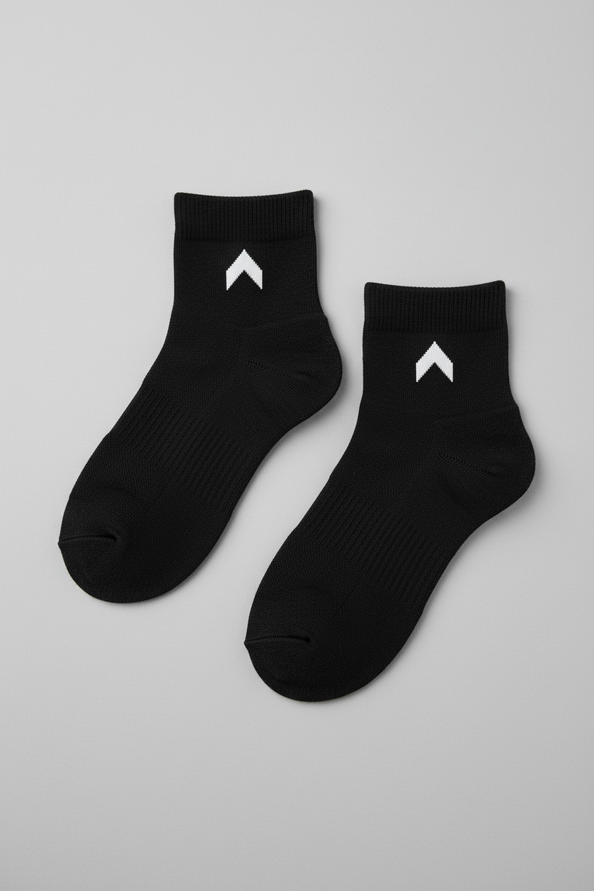 Black ankle socks with white logo