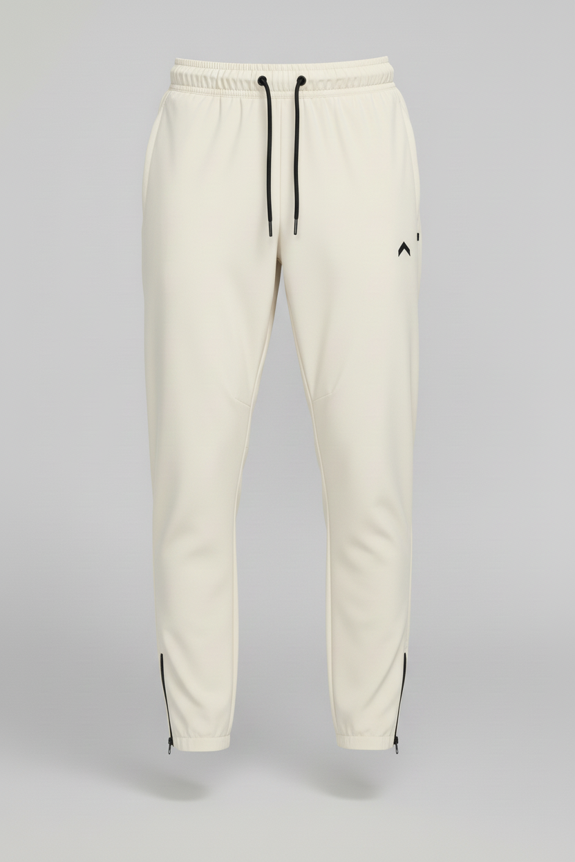 Cream athletic joggers with black logo