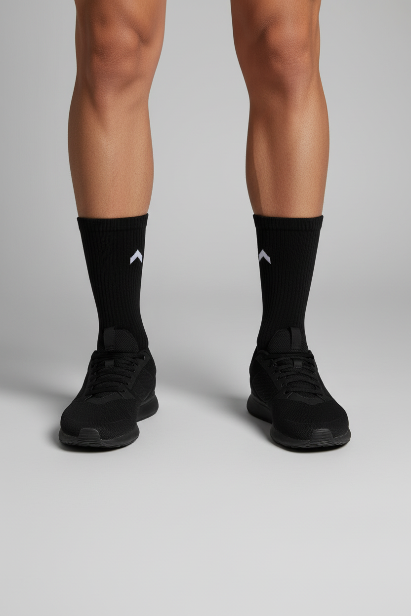 Person wearing black crew socks