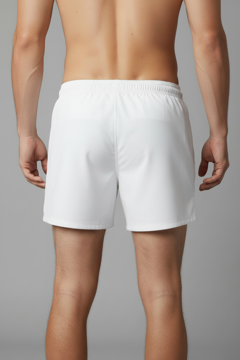 White 7" swim trunks back on model